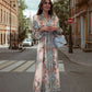 Letnie promocje 💗 Elegancka sukienka w kwiaty z wysokim dekoltem i guzikami w talii
