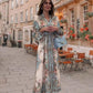 Letnie promocje 💗 Elegancka sukienka w kwiaty z wysokim dekoltem i guzikami w talii