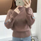 Zimowy sweter z kaszmiru z symetrycznym haftem kwiatowym